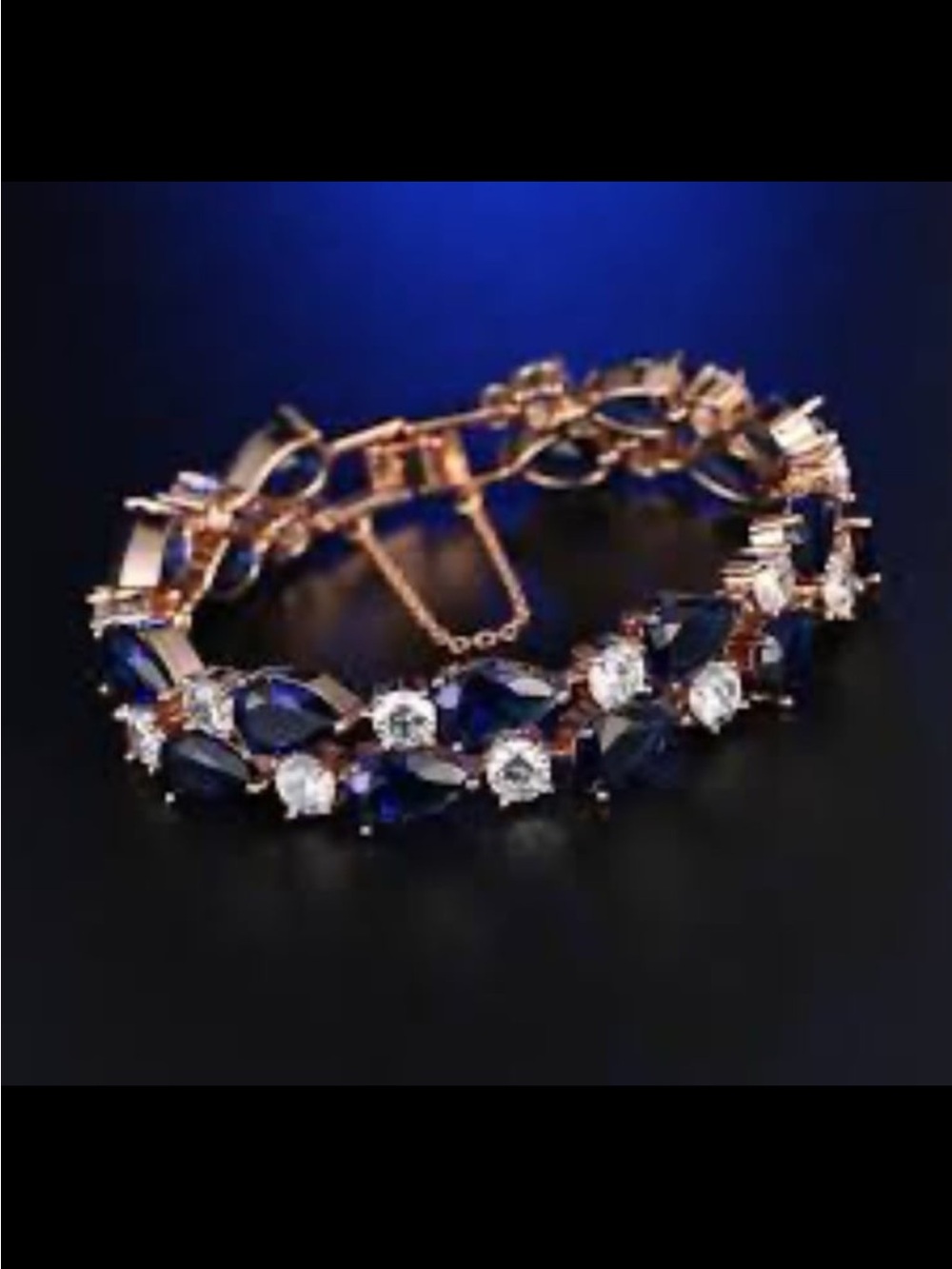 Gold plated tear drop crystals sapphire and clear crystals tennis bracelet